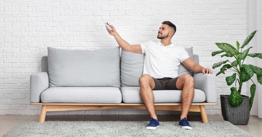 man turning on the AC