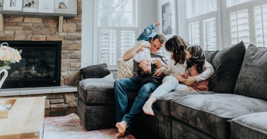 Family spending quality time inside their home