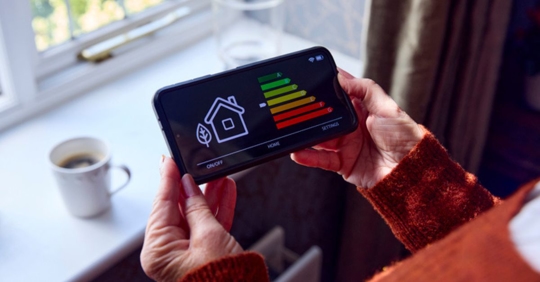 Homeowner checking smart home technology settings