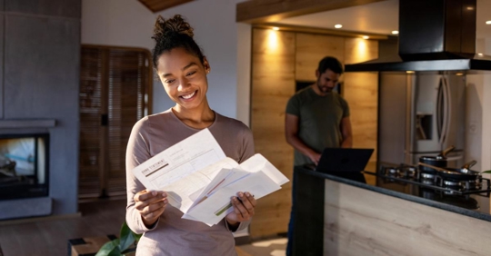 homeowner happy with the electricity bill